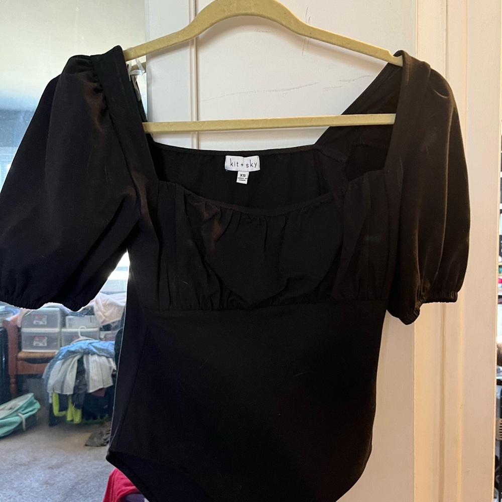 Woman’s bodysuit top